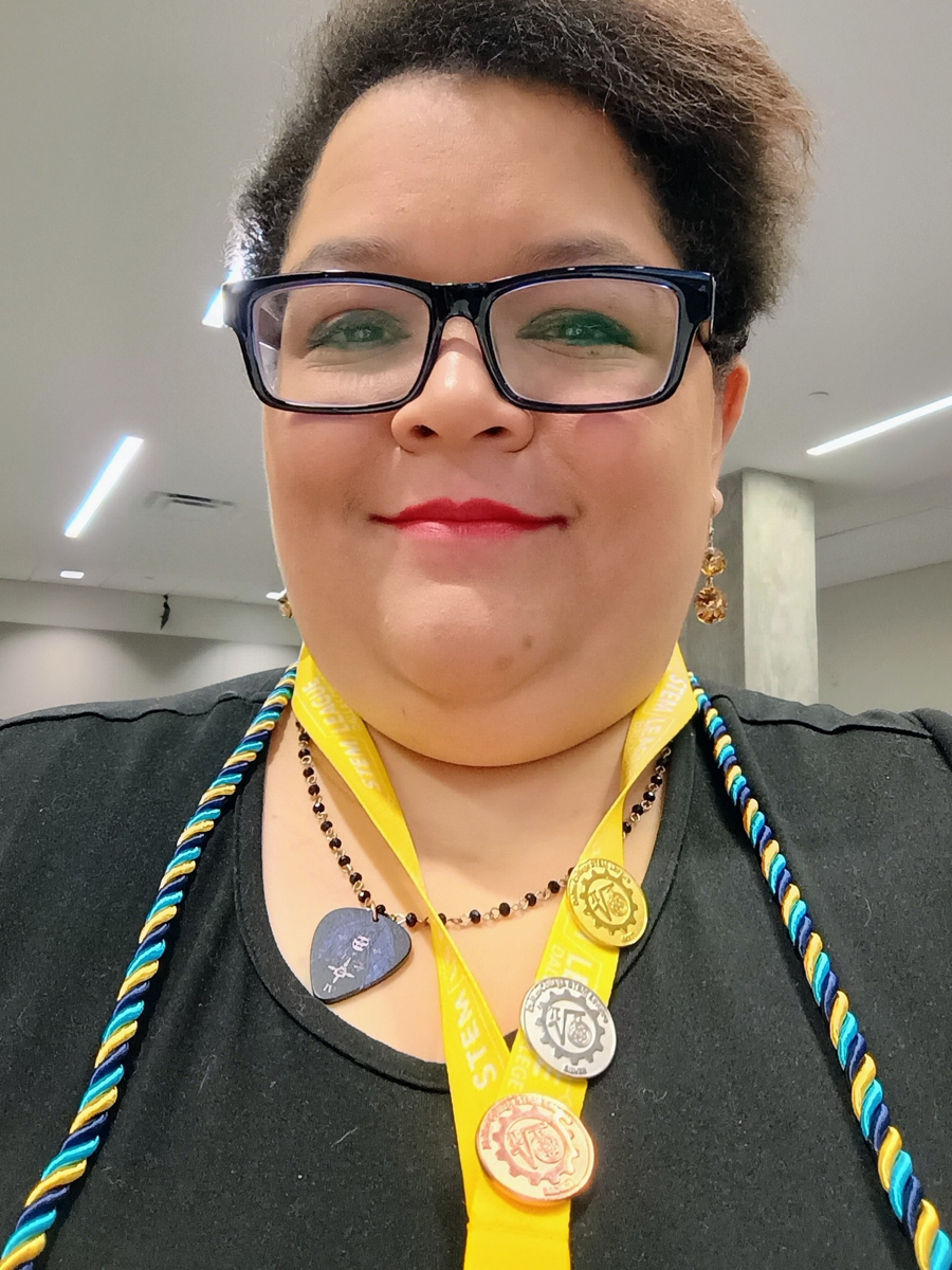 Crystal Hollis wearing STEM achievement medals